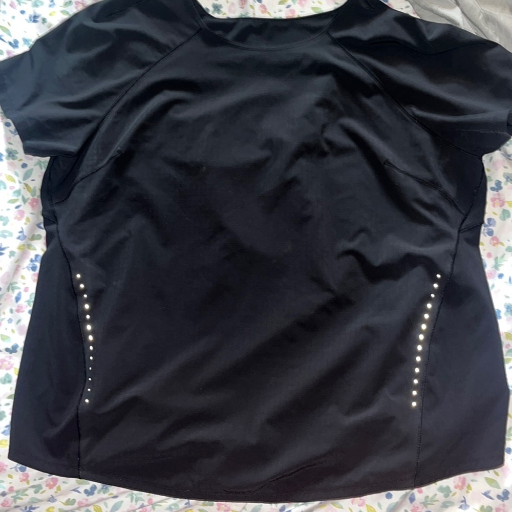 Lululemon running shirt, very thin material. Worn once. Size 10! Black!